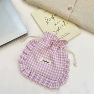 Pink gingham drawstring storage bag with ruffle lace trim, sweet fabric pouch for underwear.