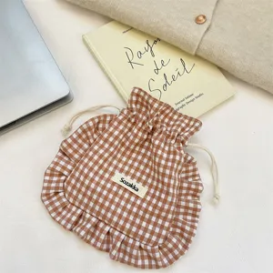 Brown gingham drawstring pouch with ruffles, cute fabric storage bag for socks and underwear.