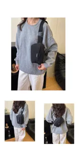 Detailed view of black functional chest bag, versatile crossbody bag with adjustable strap.