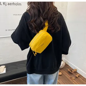 Yellow casual chest bag detail view, showing the compact and practical daily crossbody design.