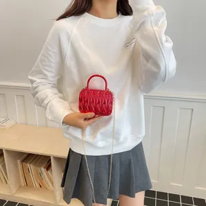Red acrylic pleated crossbody bag with chain strap, stylish chic mini box handbag for women.