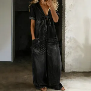 Casual summer denim jumpsuit featuring short sleeves, front tie and wide leg pants.