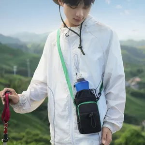 Outdoor sports water bottle bag detail view, black and green cross-body pouch for hiking.