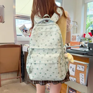 Sac à dos décontracté vert avec motif d'étoiles pour femmes et étudiants, joli sac de voyage.