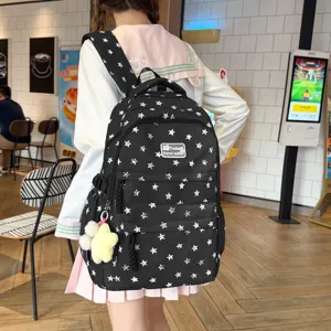 Sac à dos scolaire noir avec étoiles imprimées style doux sac de voyage mignon ados.