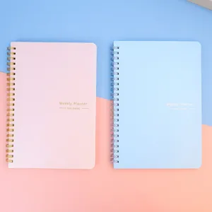A5 Wochenplaner Notizbuch mit Spiralbindung,undatiertes Design,rosa und blaue Pastellcover.