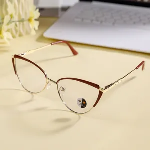 Detailed shot of stylish metal cat-eye glasses frame featuring photochromic anti-blue light lenses.