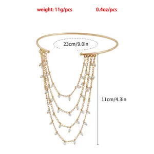 Gold arm cuff chain with layered tassel and pearl pendants, retro bohemian upper arm jewelry.