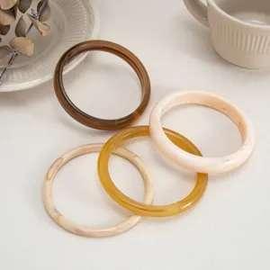 Resin clear marbled bangle bracelets set, stylish retro stacking bracelets for women daily wear.