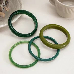 Colorful stained transparent resin bangle set featuring smooth arc design for women.