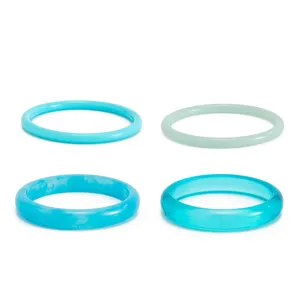 Colorful resin bangles set featuring transparent and gradient blue styles for women fashion.