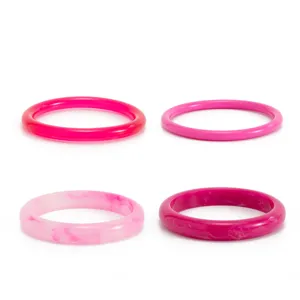 Detailed shot of four colorful resin bangles with transparent tie-dye patterns and smooth arcs.