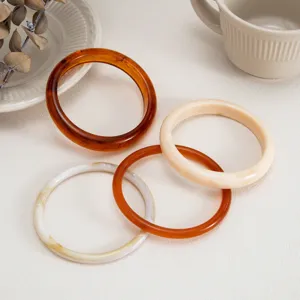 Fashionable colorful stained transparent resin bracelet set, stylish smooth arc bangle jewelry.