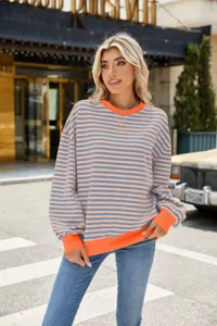 Lässiger, lockerer Langarm-Farbblock-Ringelpullover mit Rundhalsausschnitt für Damen im Herbst.