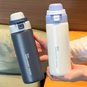 Portable stainless steel insulated water bottle detail shot, double drinking design for daily use.