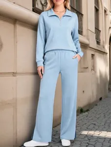 Women solid color half-zip long sleeve sweatshirt and wide leg pants casual two piece set.