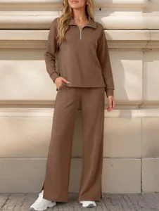 Detail shot of brown casual two-piece set, half-zip collar sweatshirt and wide-leg pants.
