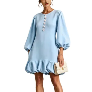 Light blue mini dress featuring floral buttons, lantern sleeves, and a stylish bubble ruffle hem.