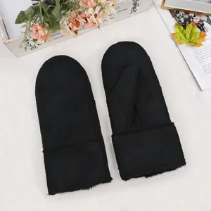 Women's black winter warm faux shearling mittens, classic cozy plush thermal gloves top view