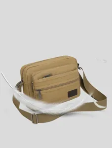 Men's multi-layer canvas shoulder bag, casual business commuter crossbody bag with multiple pockets.