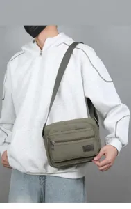 Men canvas messenger bag multi-pocket casual shoulder crossbody bag for daily commute.