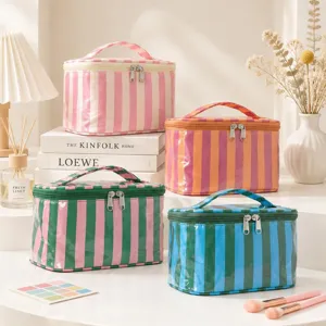 Bolsa de maquillaje impermeable a rayas colorblock, gran organizador de artículos de tocador.