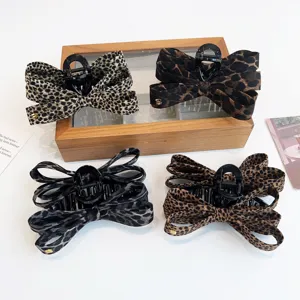 Pince à cheveux nœud multicouche imprimé léopard rétro, accessoire élégant et polyvalent.