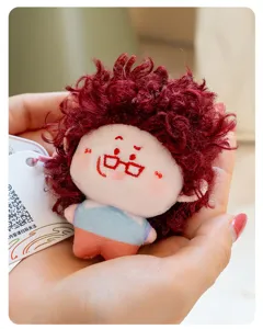 Cute fluffy curly hair doll plush pendant detail view, perfect bag charm and key chain gift.