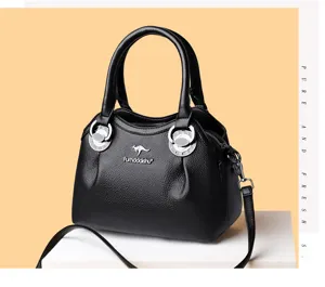 Elegant black leather handbag for women, versatile shoulder and crossbody bag with top handle.
