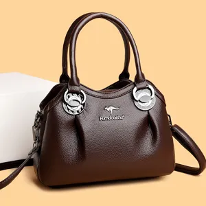 Brown leather handbag for women, stylish top handle satchel with adjustable shoulder strap.