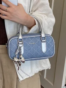 Stylish quilted denim pillow bag with silver handles for women commuter fashion casual handbag.