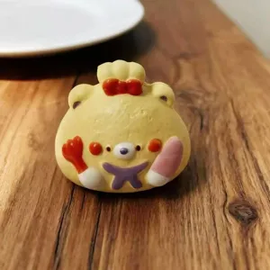 Cute bear bread squishy toy detail view, slow rebound stress relief toy, soft PU decompression.