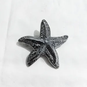 Silver starfish hair clip metallic sparkling hairpin elegant hair accessory for women styling detail