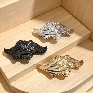 Chic irregular metal hair claw clip, high-end wavy design hairpin for women and daily styling.