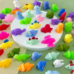 Colorful mini dinosaur squishy toys detail view, cute soft rubber stress relief animal figures.
