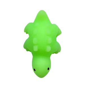 Cute green dinosaur squishy toy for stress relief, soft rubber animal figurine gift.