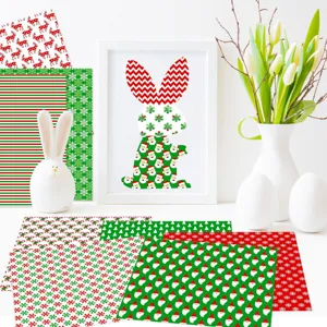 Detailed view of Christmas scrapbook paper and background cards for DIY crafts and albums.