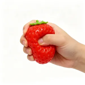 Strawberry squishy toy detail showing soft slow rebound texture and cute fruit design.