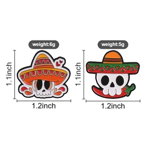 Close-up detail of Mexican skull sombrero enamel pins, cute cartoon day of dead metal badge.