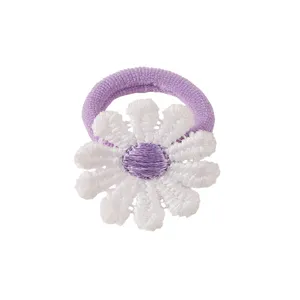 Cute floral hair tie for kids, purple elastic band with white embroidered daisy flower.