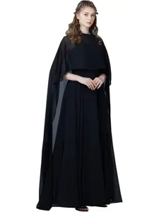 Detailed view of the elegant black chiffon cape showcasing smooth texture and graceful flow.