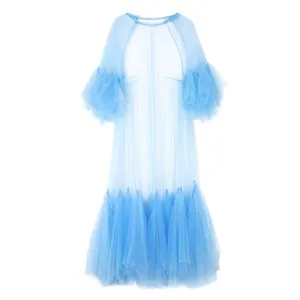 Exquisite sheer blue mesh detail, multi-layered pleated ruffles, elegant sleeve texture.