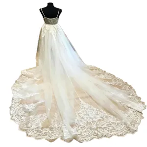 Elegant bridal tulle skirt featuring a gorgeous long lace train and multi-layer mesh design.