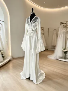 Elegant white satin long robe with delicate lace trim, perfect for bridal morning wear.