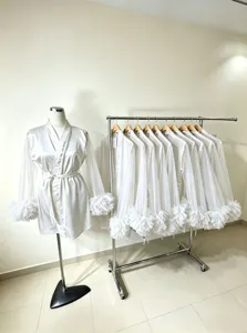White long sleeve bridal robe with mesh ruffled cuffs and matching waist belt detail