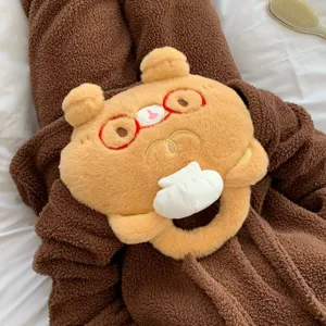 Cute plush rechargeable hand warmer with adorable bear face design and soft texture detail.