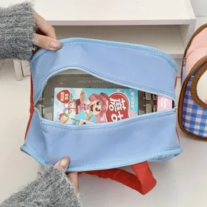 Insulated lunch bag detail view showing spacious interior and foil lining, ideal for daily use.