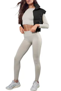 Ribbed crop top leggings set with black cropped puffer vest for women casual wear detail.