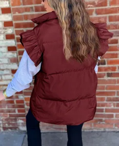 Back detail view of a stylish burgundy puffer vest with ruffle sleeves and stand collar.