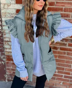 Grey padded puffer vest with ruffles, snap button front and detachable hood for women.